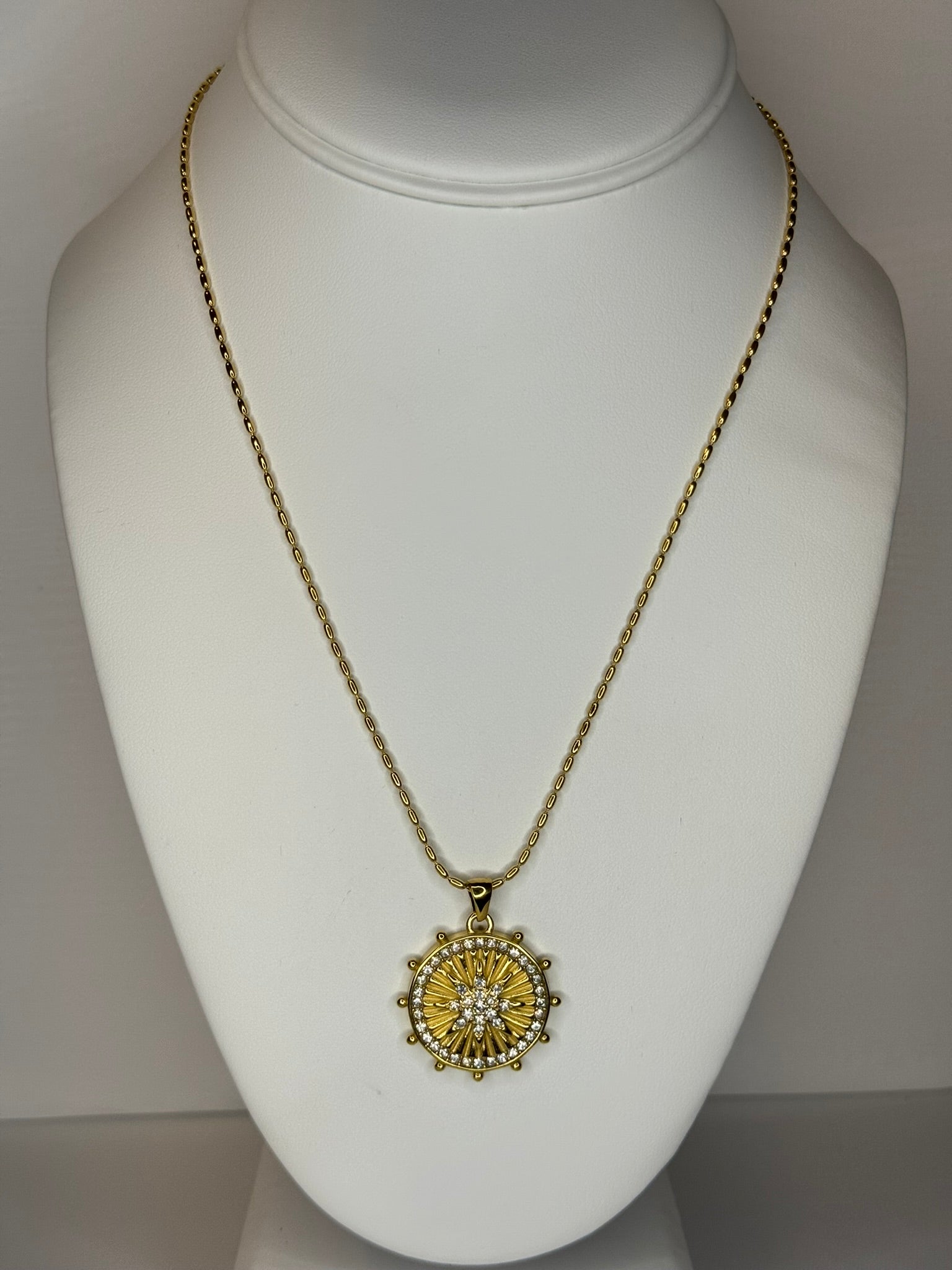 Round Gold Star Like Compass Pendant